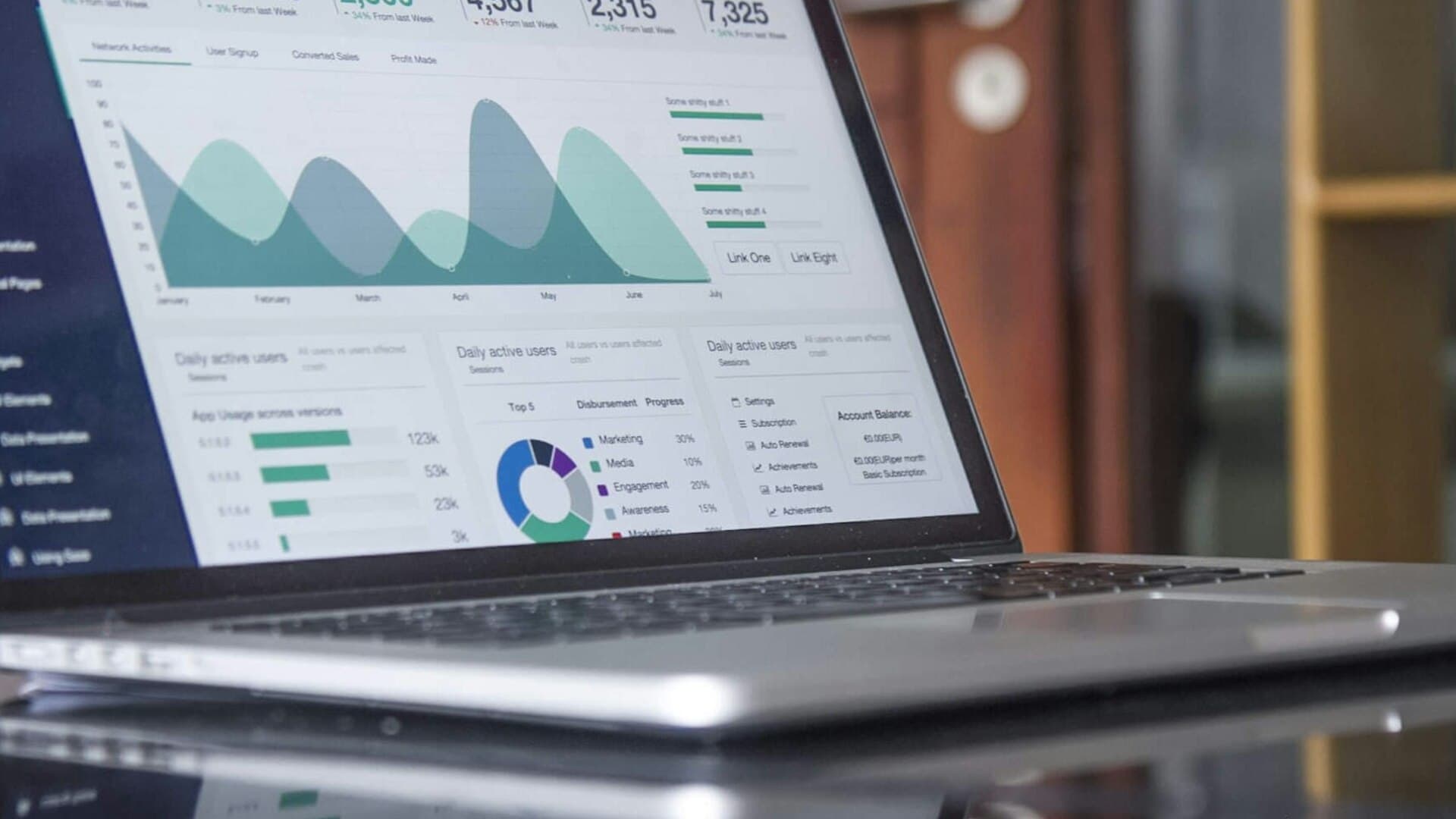 Modern personal finance dashboard glowing on a glass desk