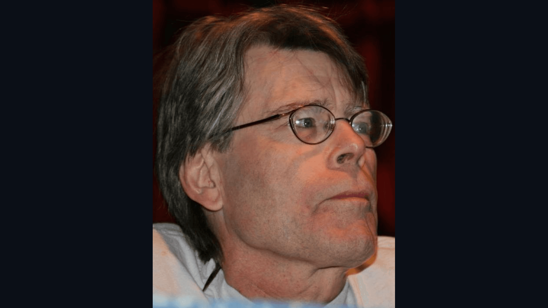 Stephen King speaking at a public event