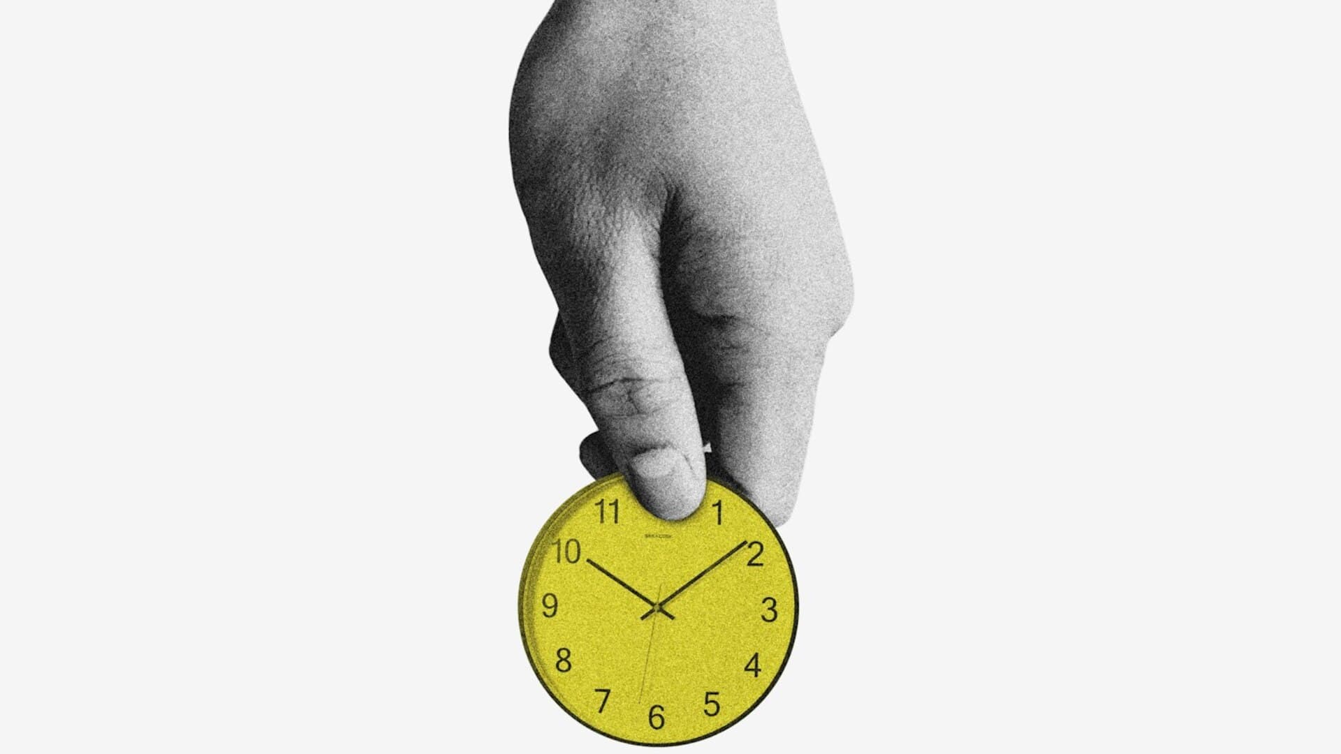 Vintage pocket watch resting on stacked coins with soft green bokeh light