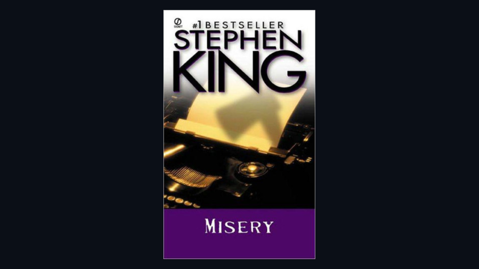 Cover of Misery by Stephen King framed on a dark background